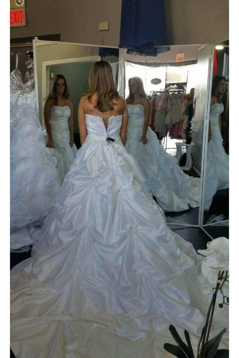 2024 Wedding Dresses Sweetheart Taffeta With Ruffles And Beads Chapel Train