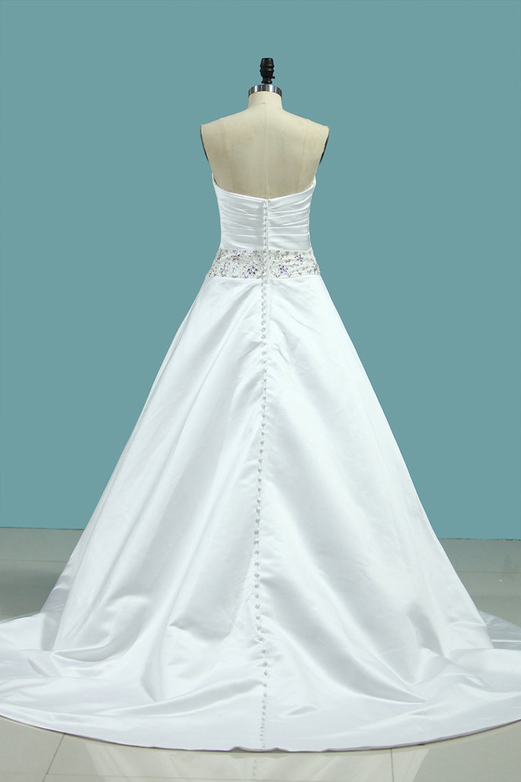 2024 Satin Wedding Dress Strapless A Line With Beads And Ruffles Chapel Train